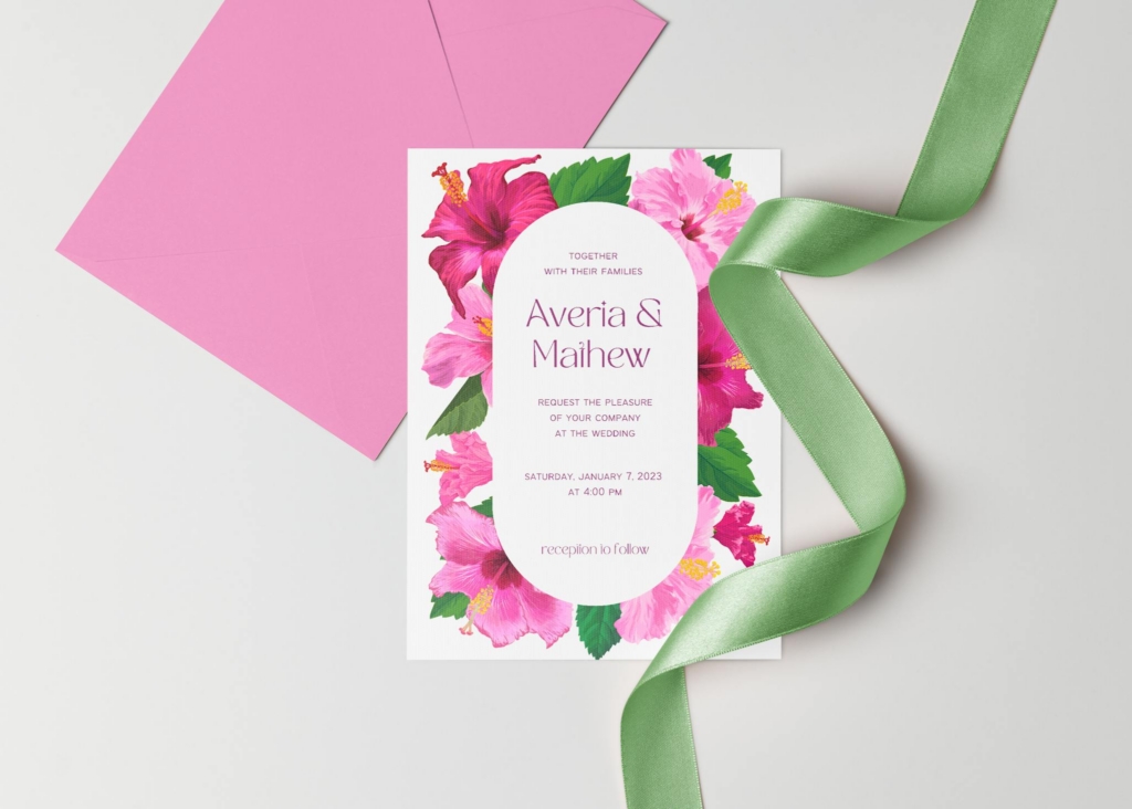 Elegant wedding invitation with floral design and pink envelopes, perfect for special celebrations.